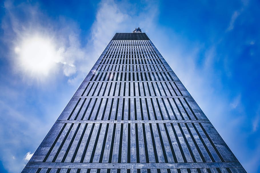 low-angle photography of high-rise building, tower, sun, sky HD wallpaper