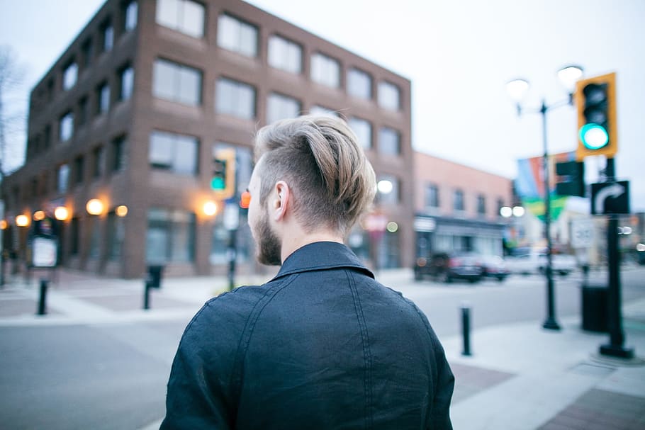 people, man, alone, walking, city, building, traffic, lights HD wallpaper