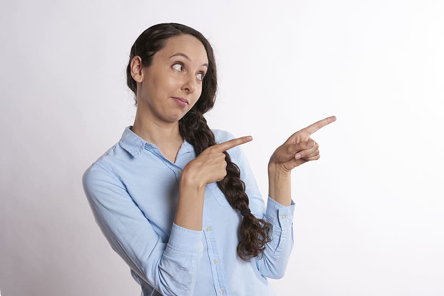 woman pointing her two index fingers on right side, people, isolated