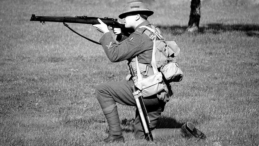 grayscale photography of man sighting rifle while kneeling on ground, HD wallpaper