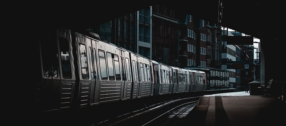 Hamburg | S-Bahn, gray metal train near buildings, tracks, platform HD wallpaper
