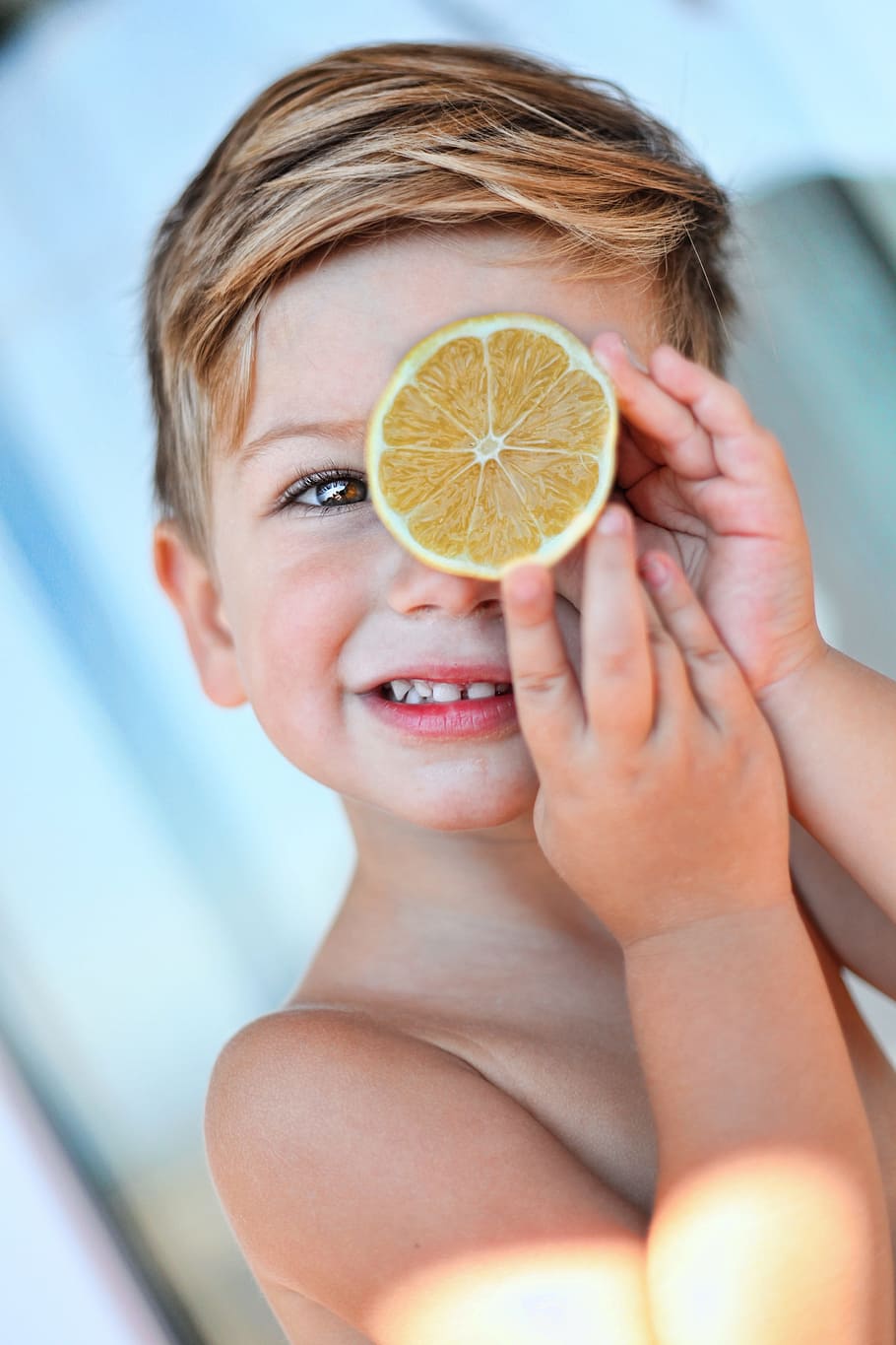 child holding sliced citrus fruit, lemon, kid, boy, cute, food HD wallpaper
