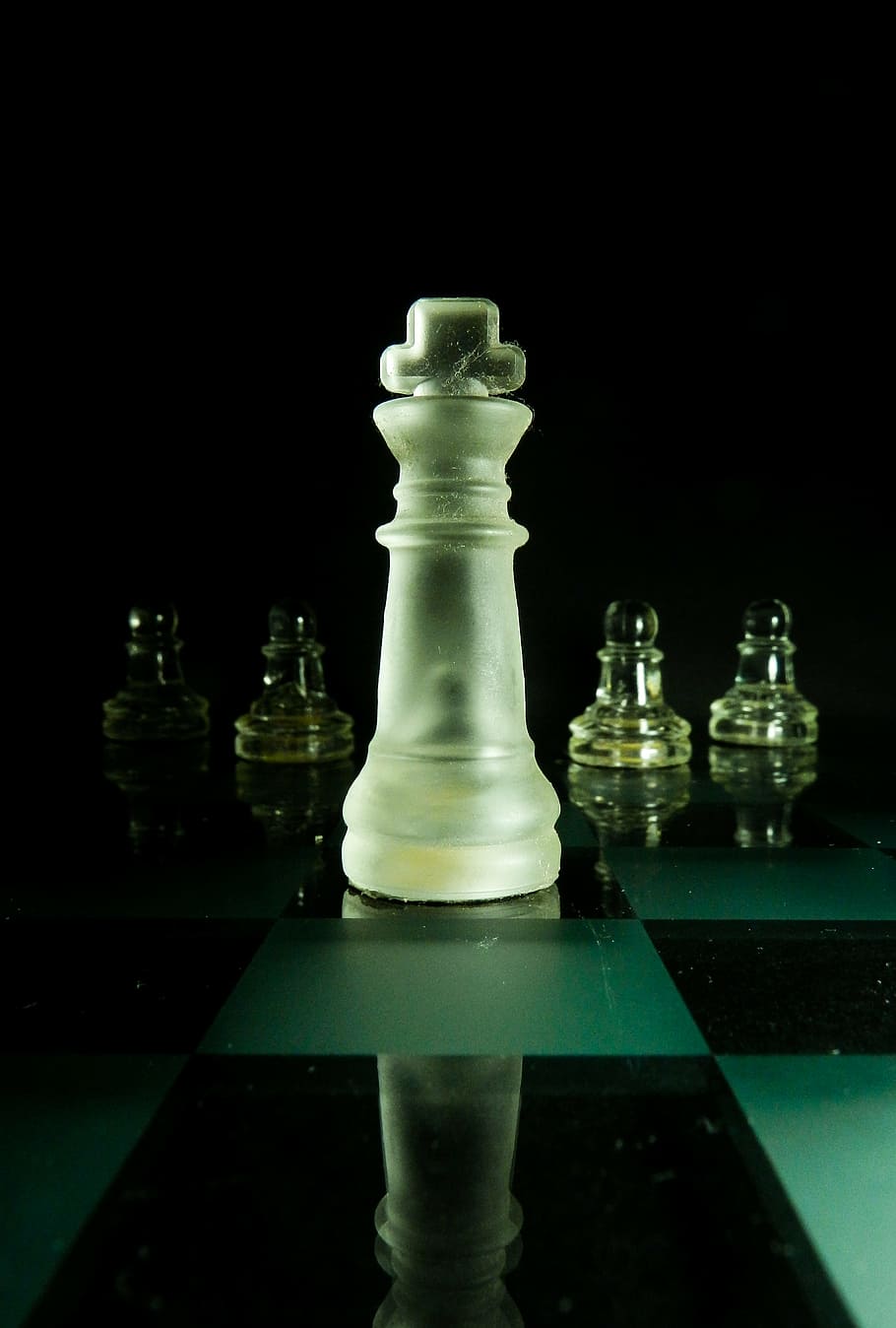Premium Photo  Chess pawn and pieces on a board background