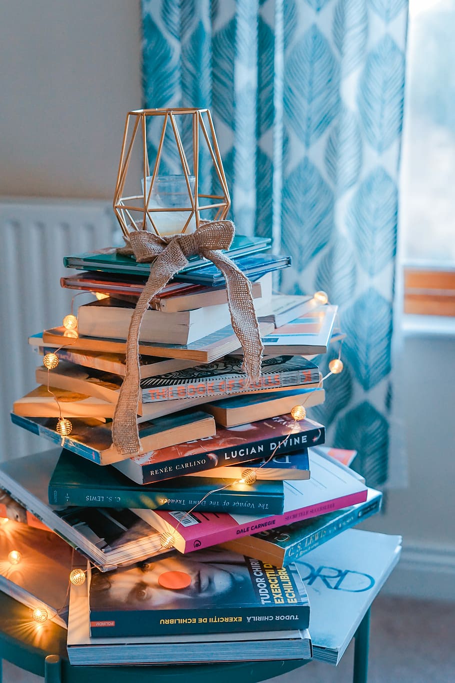 brown wooden framed candle holder on top of books, assorted book lot HD wallpaper