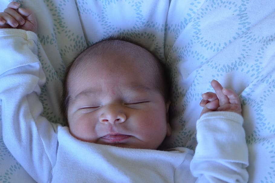 infant wearing long sleeve onesie sleeping on white cushion newborn photography, HD wallpaper