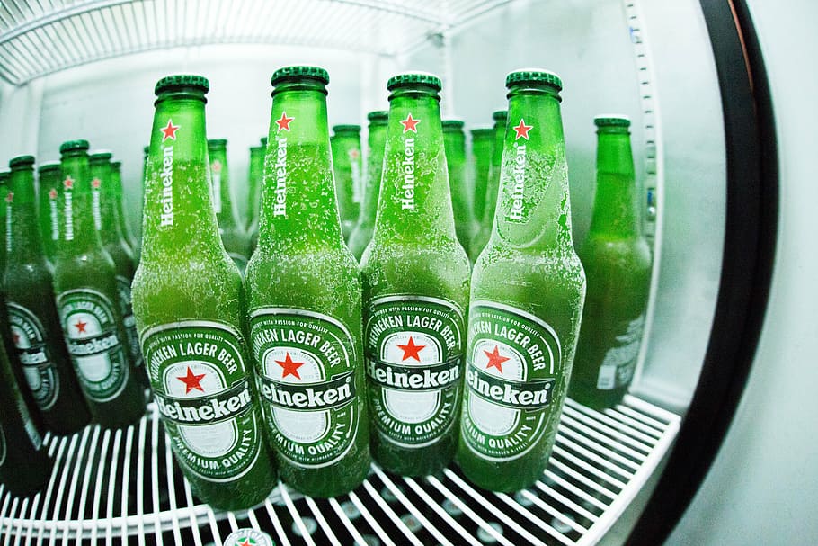 Heineken beer glass bottle lot in display cooler, bottles, fridge