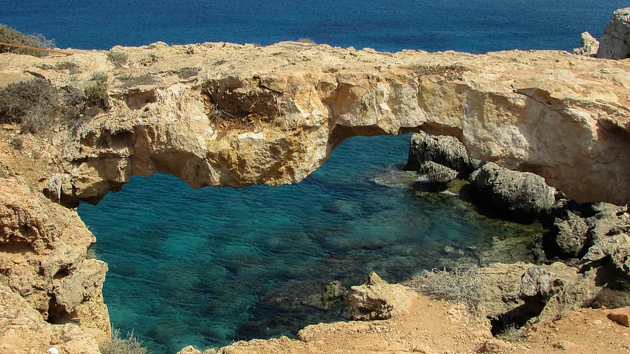 body of water near yellow rock, cyprus, cavo greko, korakas bridge, HD wallpaper