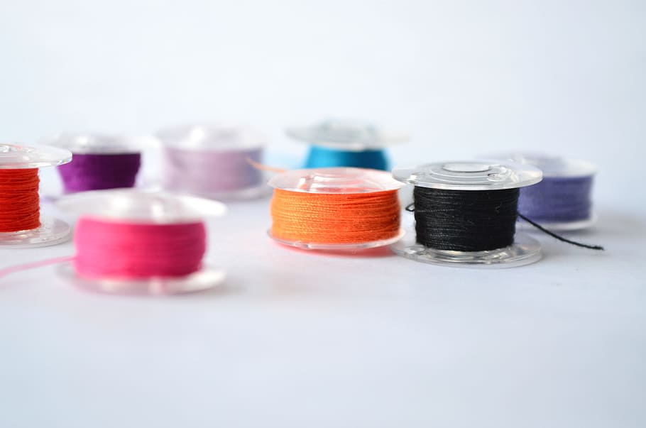 shallow focus photography of assorted-color threads, orange, black HD wallpaper