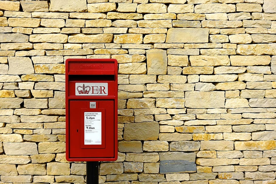red steel container beside brick wall, post-box, mail, dry, stone