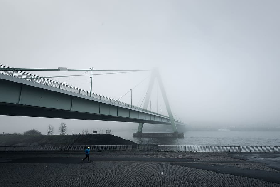 person jogging under bridge during dawn, person under bridge HD wallpaper