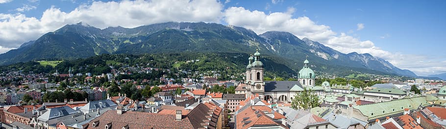 brown and white concrete buildings during daytime, summer, innsbruck