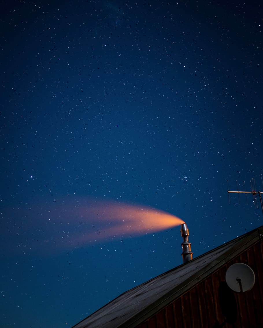 close-up photo of house, lighted chiminea at night time, sky HD wallpaper