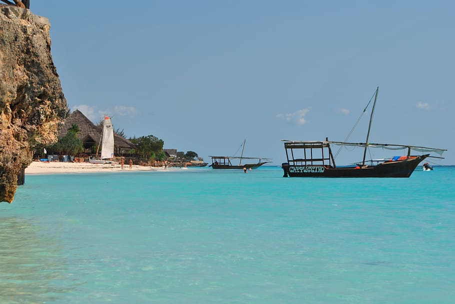 black wooden boat on blue body of water, zanzibar, africa, tanzania, HD wallpaper