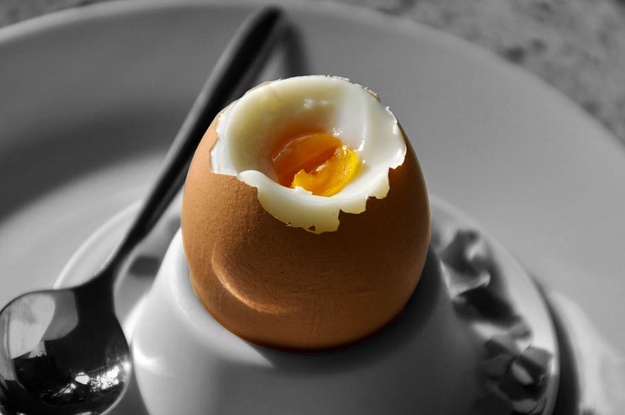boiled egg on plate beside spoon, breakfast egg, food, egg cups