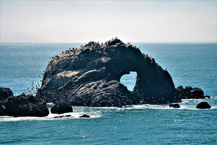 gray rock formation on body of water during daytime, rock formation on body of water during daytime HD wallpaper