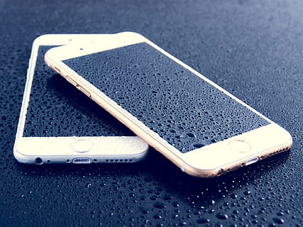 two turned-off iPhones on black surface, ios, apple, 6s, plus HD wallpaper