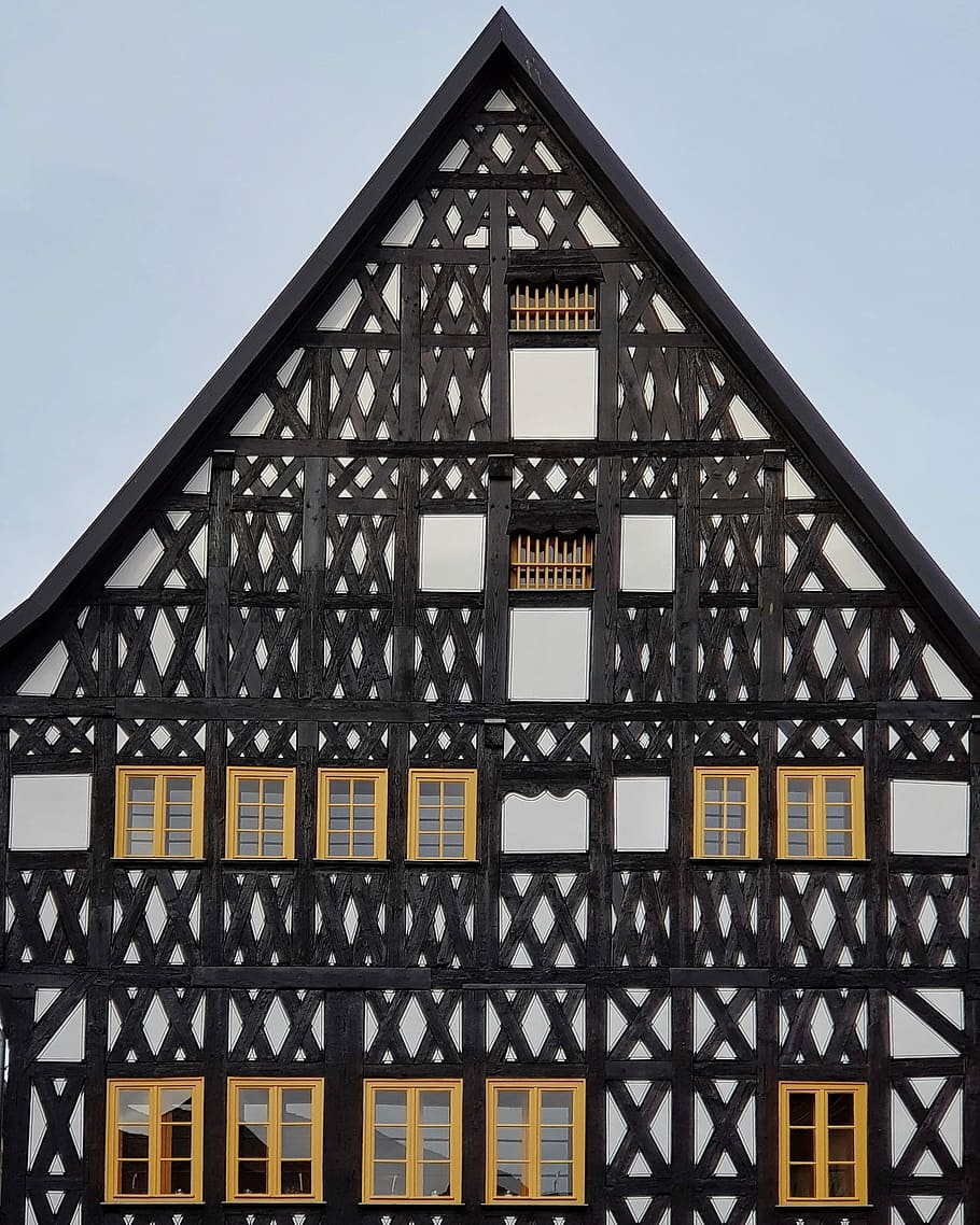 black, beige, and white wooden building with multiple windows, black and yellow wooden house decor HD wallpaper