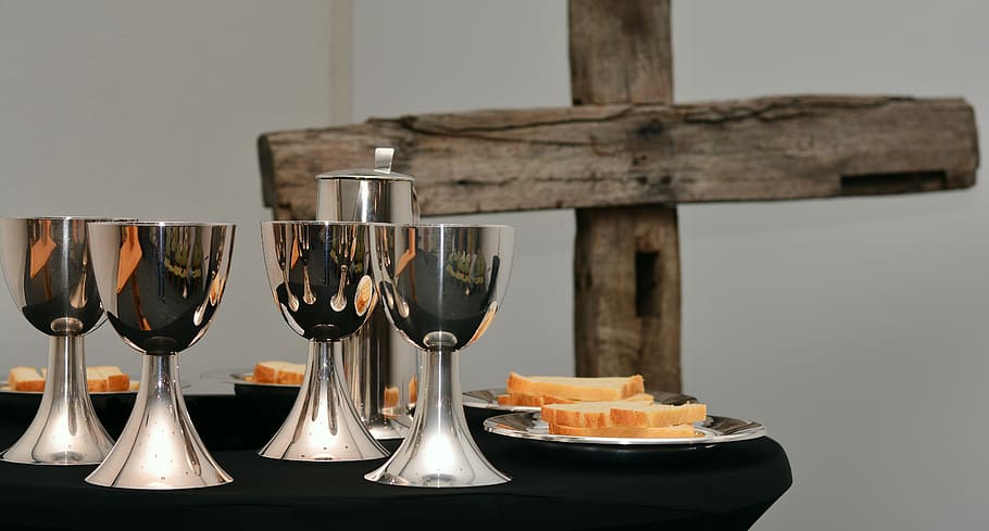 silver chalice on table, last supper, the bread and wine, eucharist chalice
