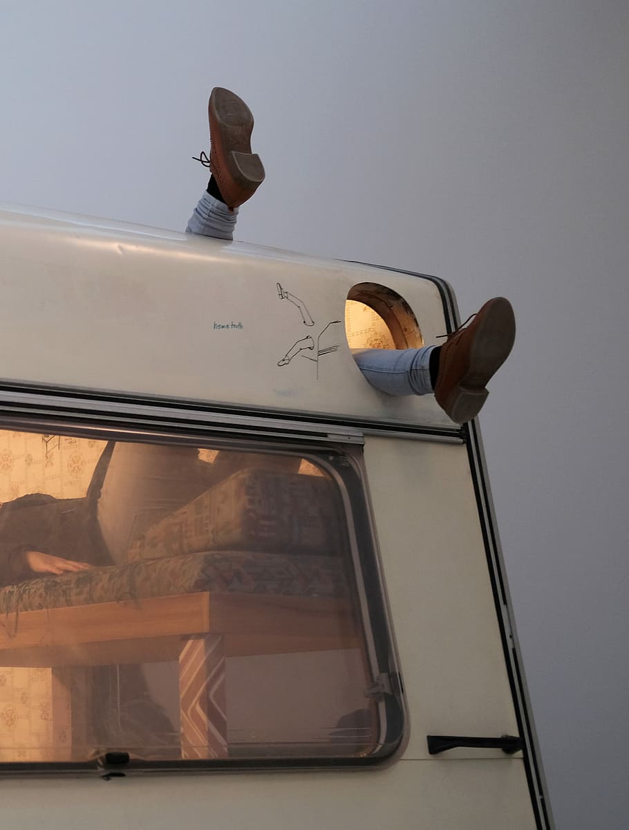 person lying on bed inside RV, caravan, mobile home, motorhome, HD wallpaper