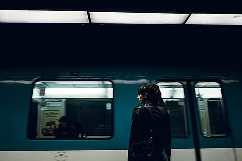 woman standing near closed train door, woman in black coat near train HD wallpaper