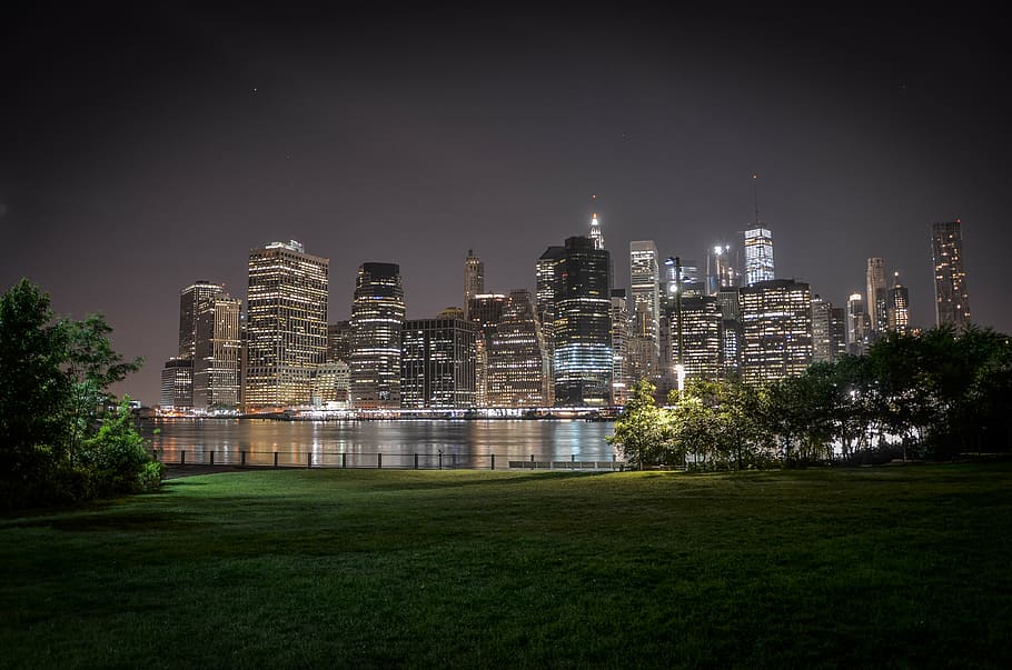 city buildings during night time, brooklyn bridge park, nyc, manhattan
