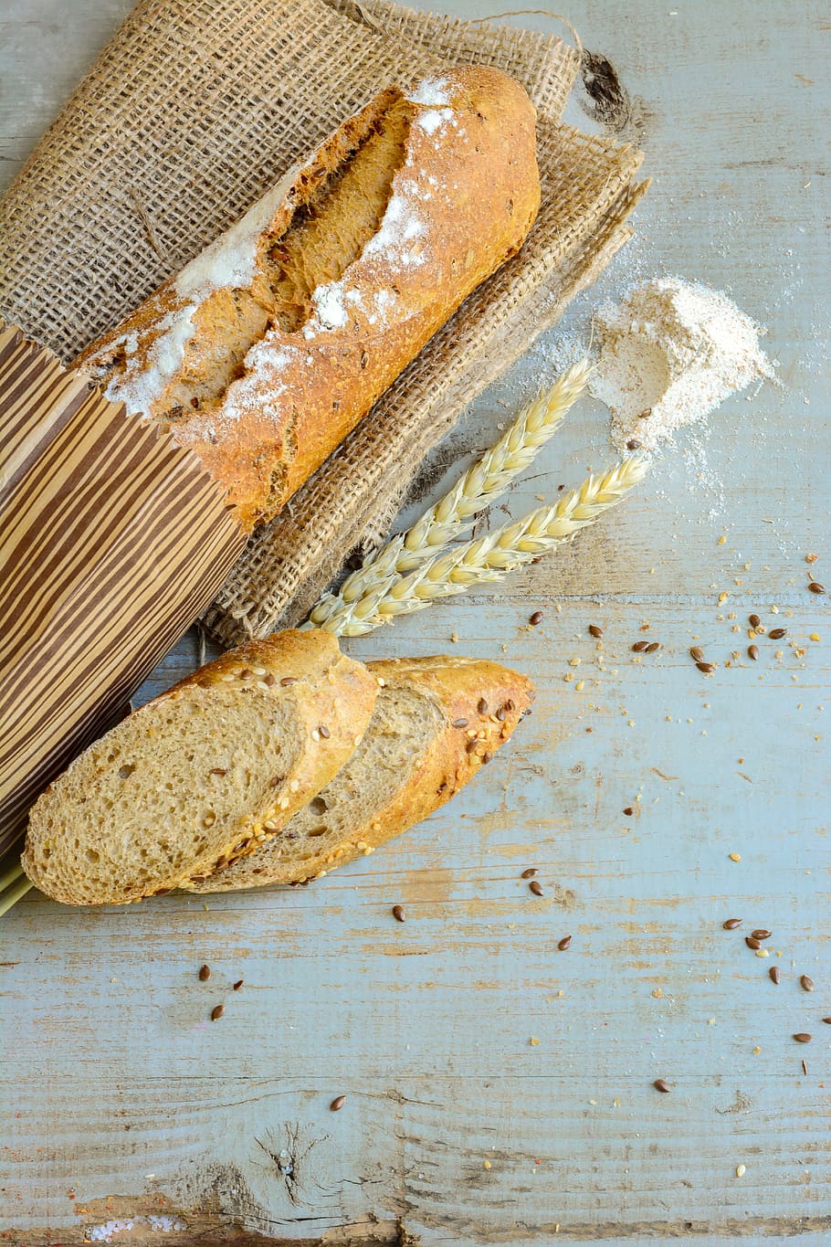 sliced french bread on table, artisan, food, paper, rustic HD wallpaper