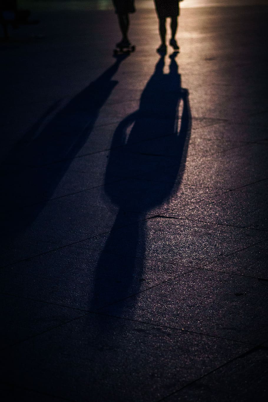 two people walking with shadows on road, two person walking outdoors showing shadows HD wallpaper
