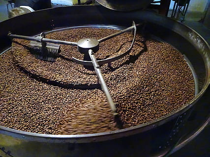 spinning gray industrial coffee grinding machine, roasting HD wallpaper