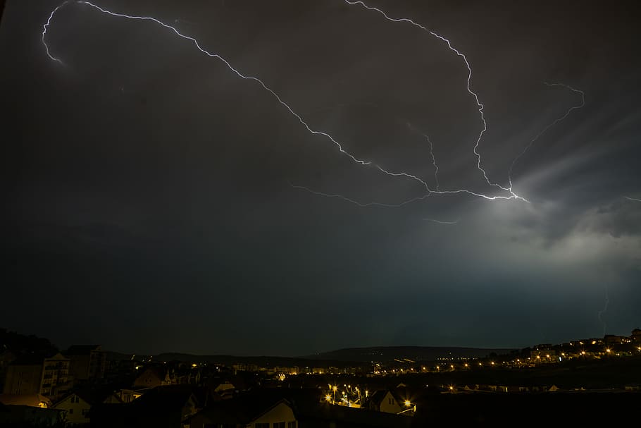 thunderstorm with cloudy skies, lightning strikes during night time HD wallpaper