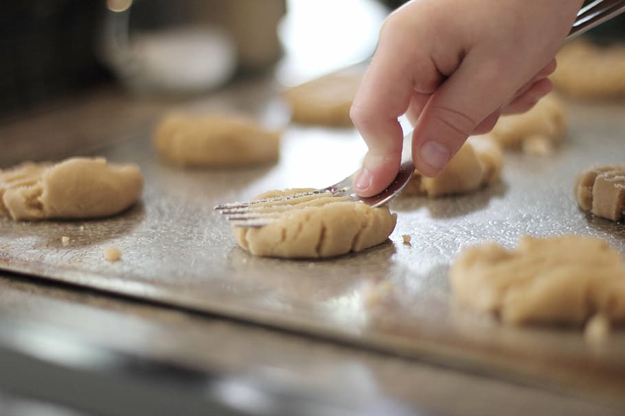 person holding stainless steel fork, cookies, baking, kids HD wallpaper