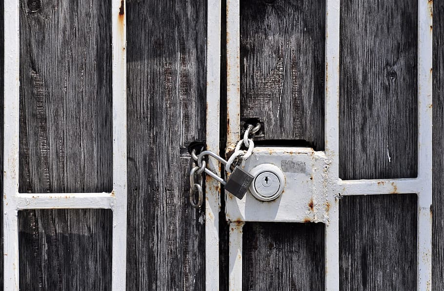 gray metal framed brown wooden gate with padlock, castle, completed HD wallpaper