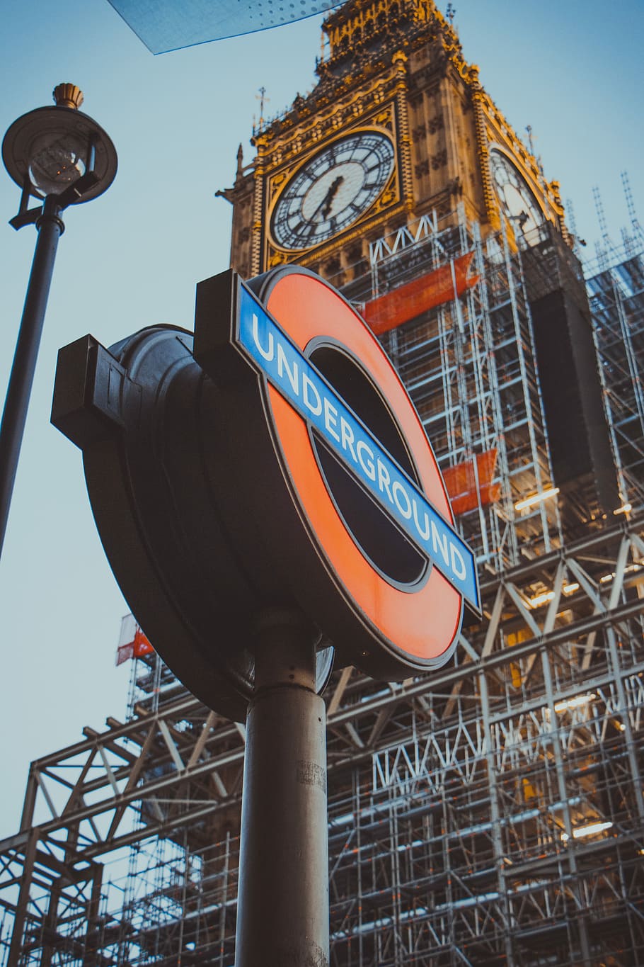 low angle photography of Underground post in front of tower clock, Underground signage HD wallpaper