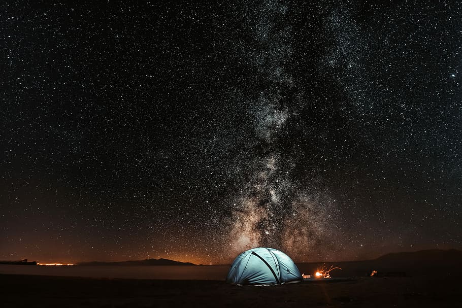 blue tent under milkyway, blue camping tent on desert during daytime