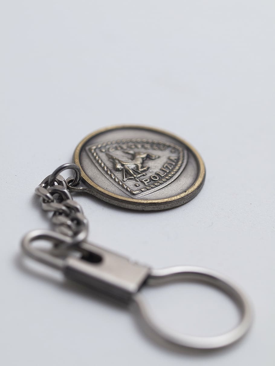 macro, keychain, police, metal, coin, currency, studio shot HD wallpaper