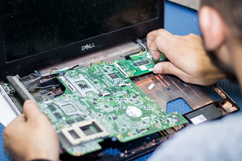 person putting green laptop circuit board, electronics, repair HD wallpaper