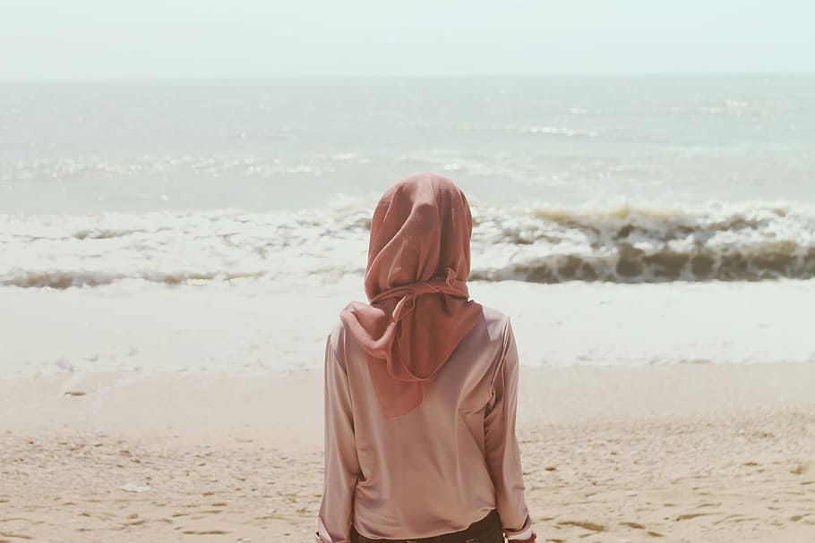woman wearing pink hijab near body of water, women, outdoors