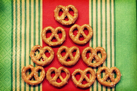eight pretzels on textile, food, red, backgrounds, food and drink HD wallpaper