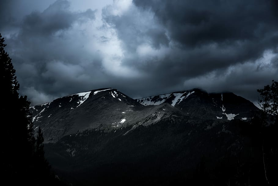 mountain range covered with snow under gray clouds, landscape photo of mountain HD wallpaper
