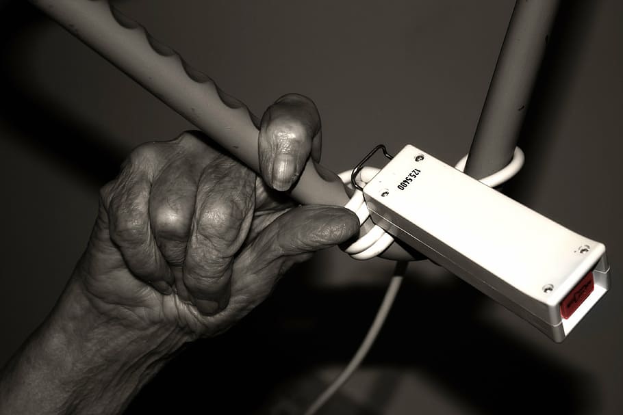 selective color photography of person holding onto bar, emergency HD wallpaper