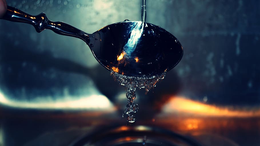 close-up photography of spoon poured with water, person, holding HD wallpaper