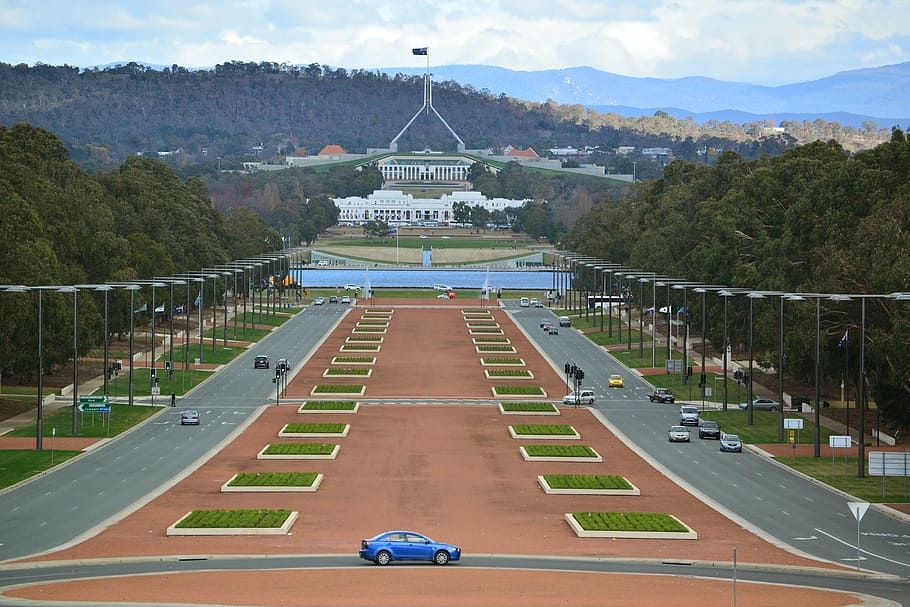 blue sedan parked near grass, canberra, australia, parliament house
