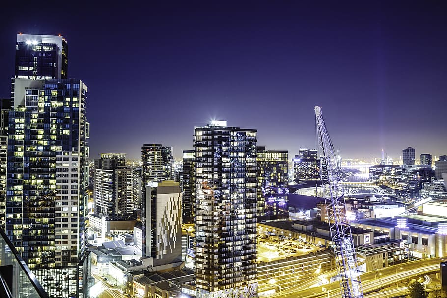 top view photography of city buildings during nighttime, bird's eyeview photo of high rise buildings HD wallpaper