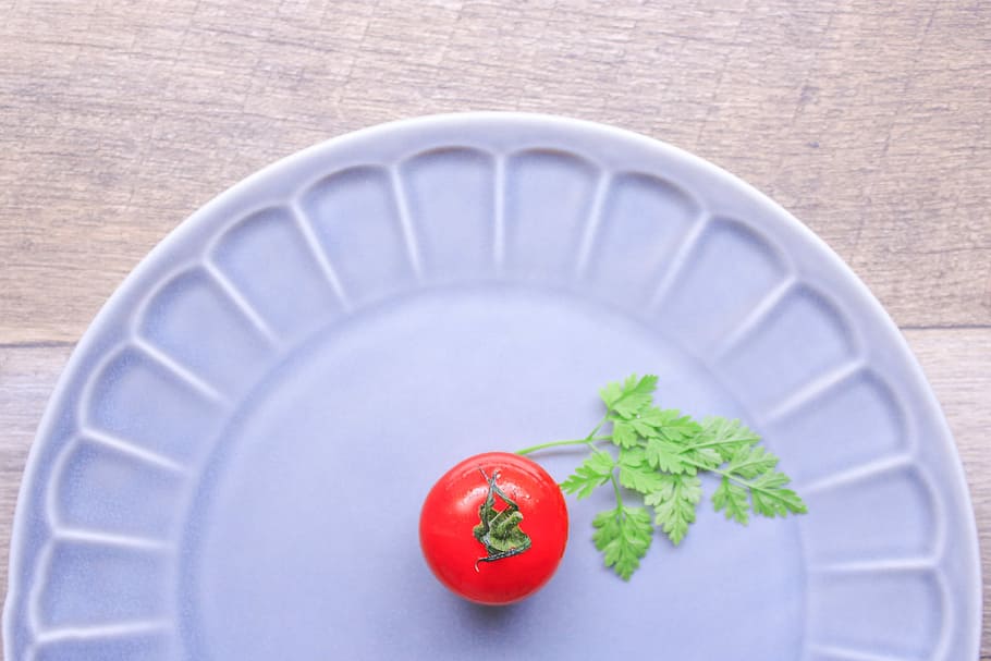 green vegetable and red food on blue ceramic plate on gray wooden surface HD wallpaper