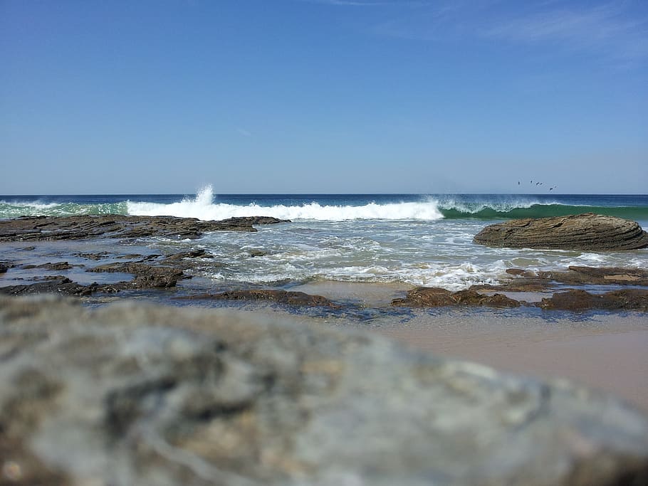 wave, ocean, beach, rock, distant, water, sea, land, motion HD wallpaper