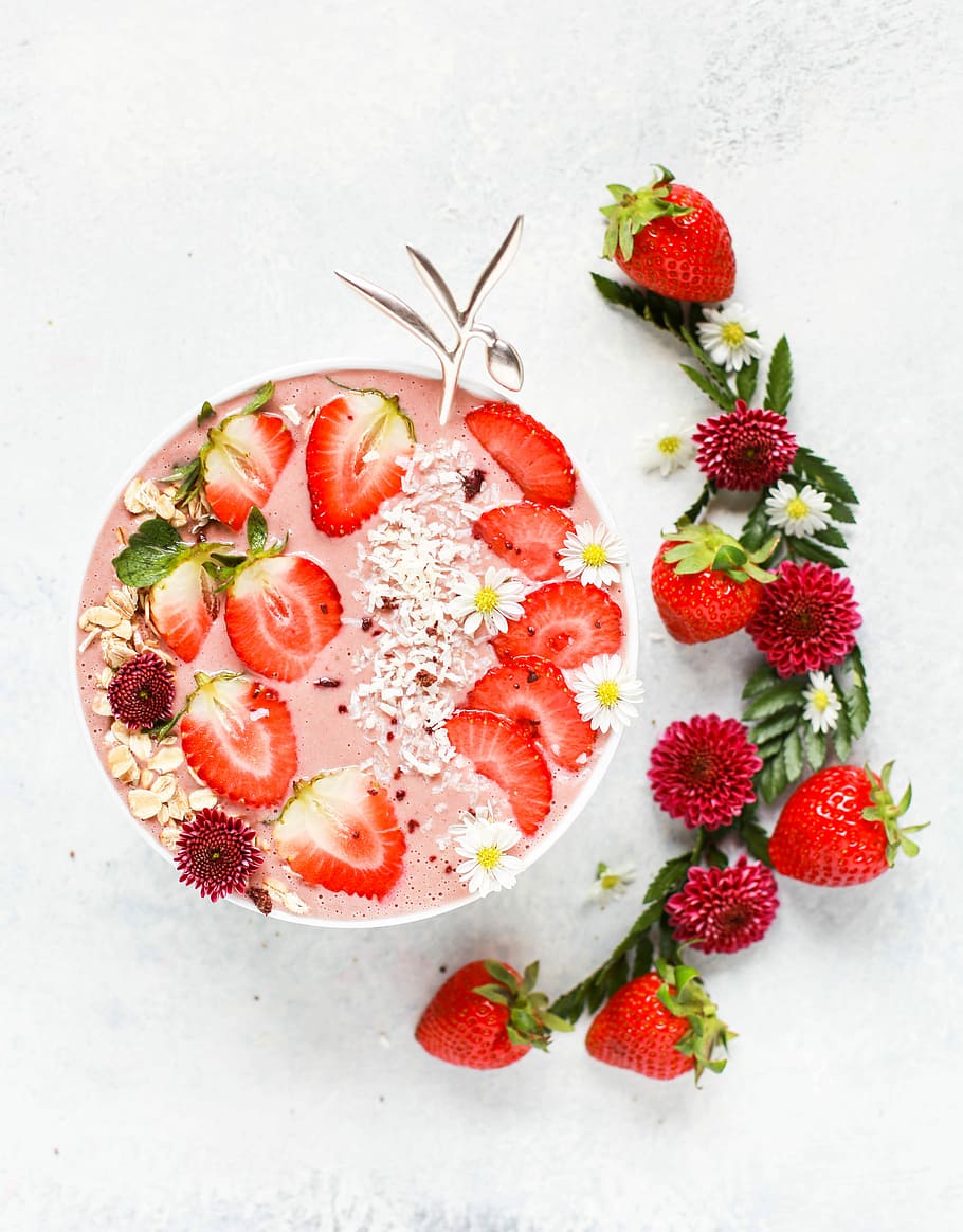 Hd Wallpaper Slice Strawberry Fruit On Fruit Shake With Petaled Flowers Strawberry Slices On Round White Ceramic Bowl Wallpaper Flare