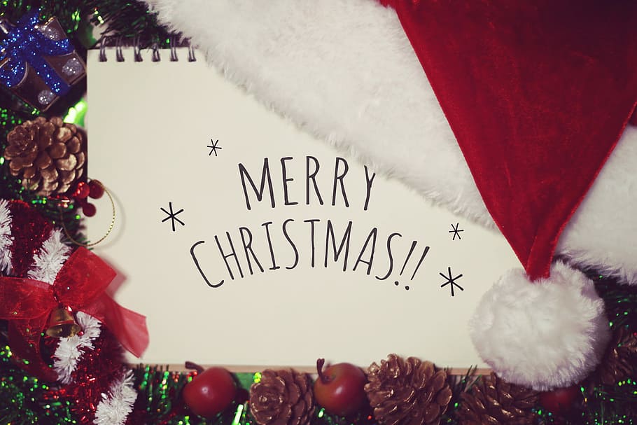 merry christmas print paper surrounded by christmas decors, celebration HD wallpaper