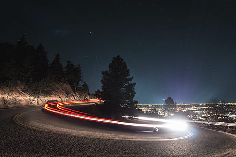 timelapse photography on curved road beside tree, time lapse photography of vehicle lights HD wallpaper