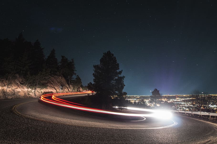 timelapse photography on curved road beside tree, time lapse photography of vehicle lights HD wallpaper