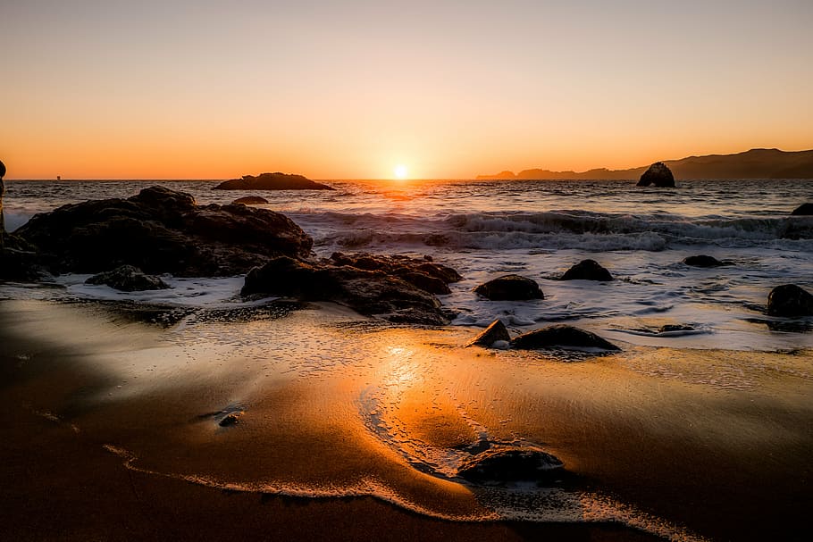 sea, sunset, beach, last light, water, land, sky, beauty in nature HD wallpaper