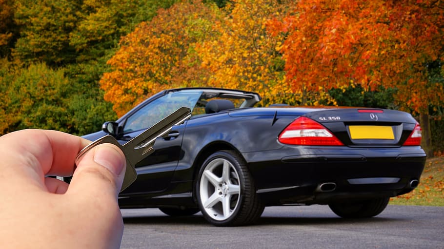 person holding key facing on coupe, car key, hand, auto, automobile HD wallpaper